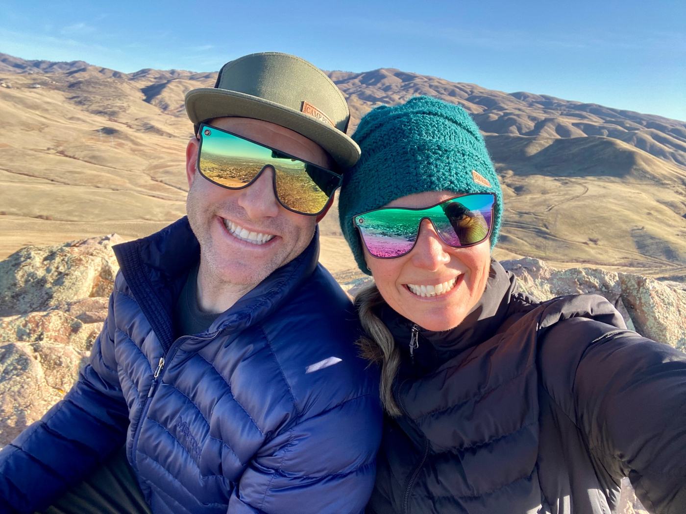 Jonathan and Courtney Rush on a summit in the Idaho foothills